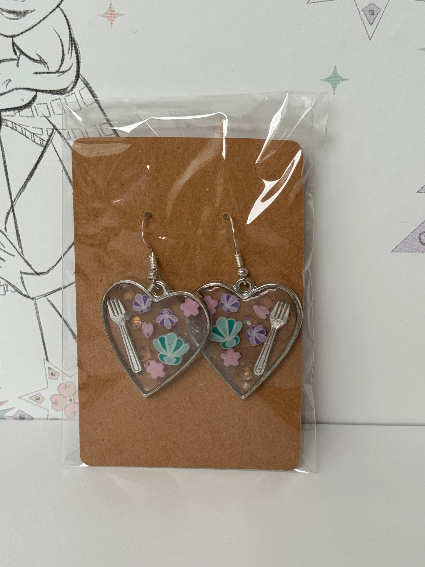 Heart-shaped earrings with fork, flowers and shells inspired by the one and only little mermaid red haired mermaid