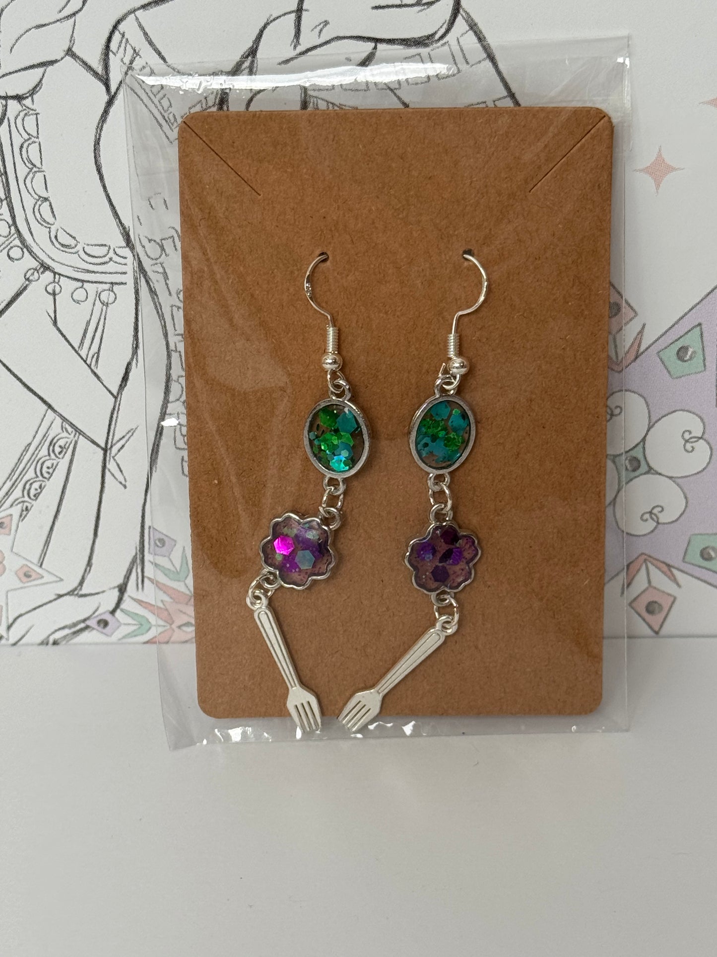 Pair of earrings with green and purple glitter resin and fork inspired by the little mermaid princess inspired