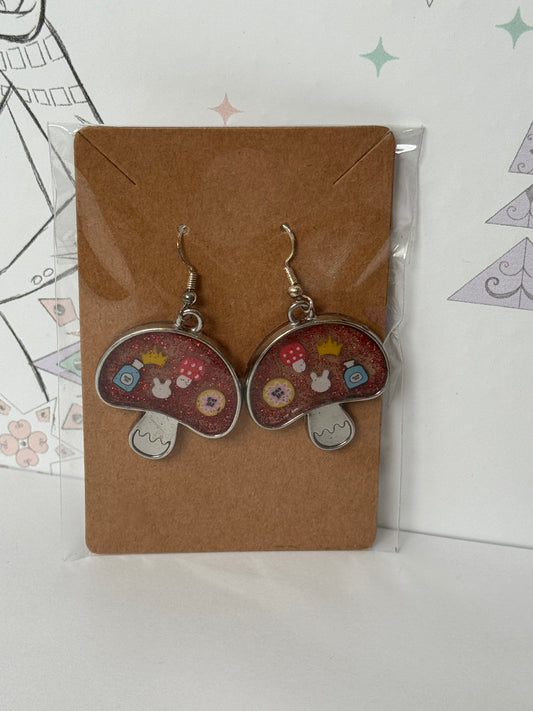 Mushroom-shaped with sprinkles featuring bunny, crown, eat me and drink me, and mushroom inspired by alice in wonderland earrings
