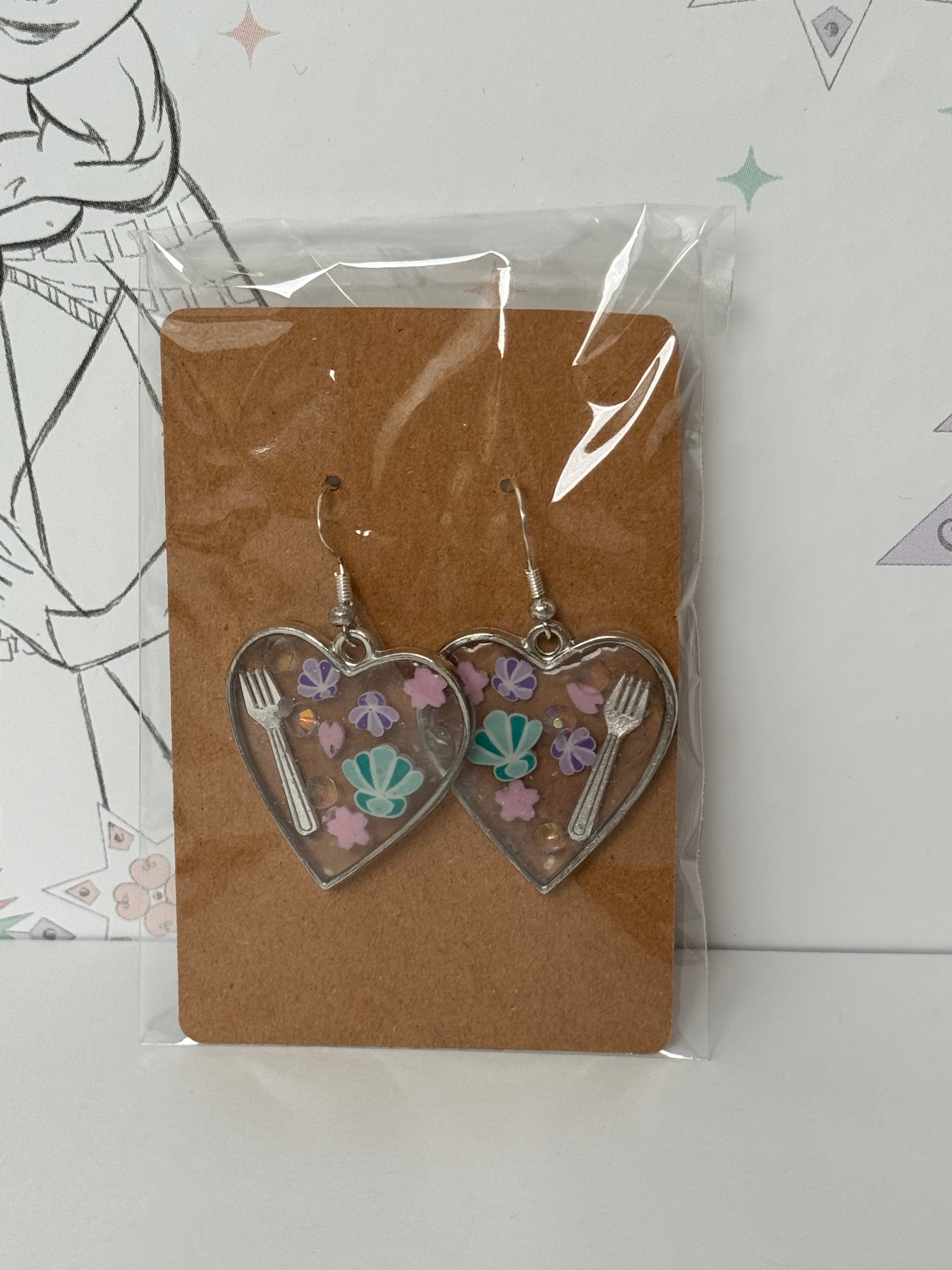 Heart-shaped earrings with fork, flowers and shells inspired by the one and only little mermaid red haired mermaid