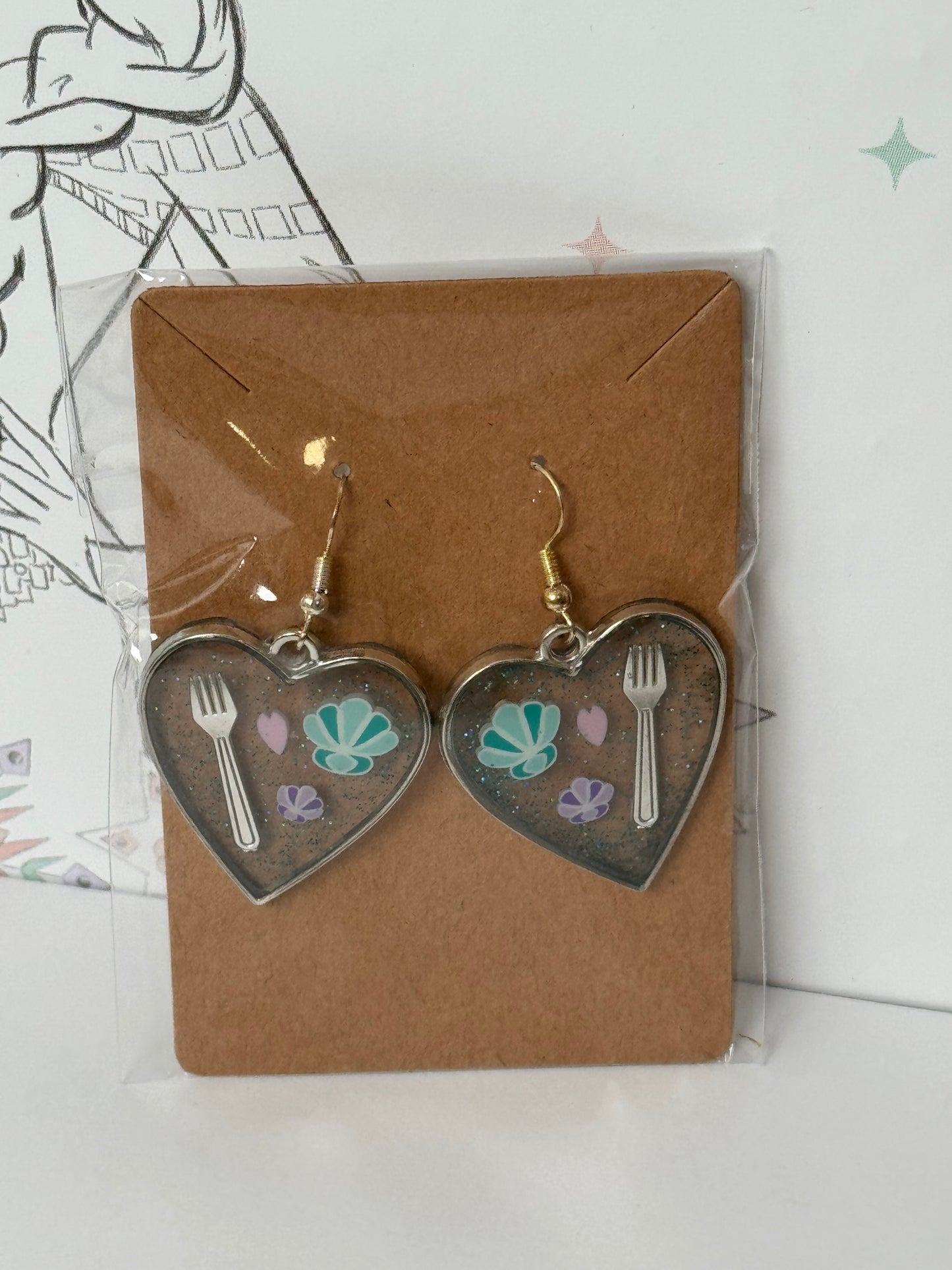 Heart-shaped earrings with fork and shells inspired by the one and only little mermaid red haired mermaid