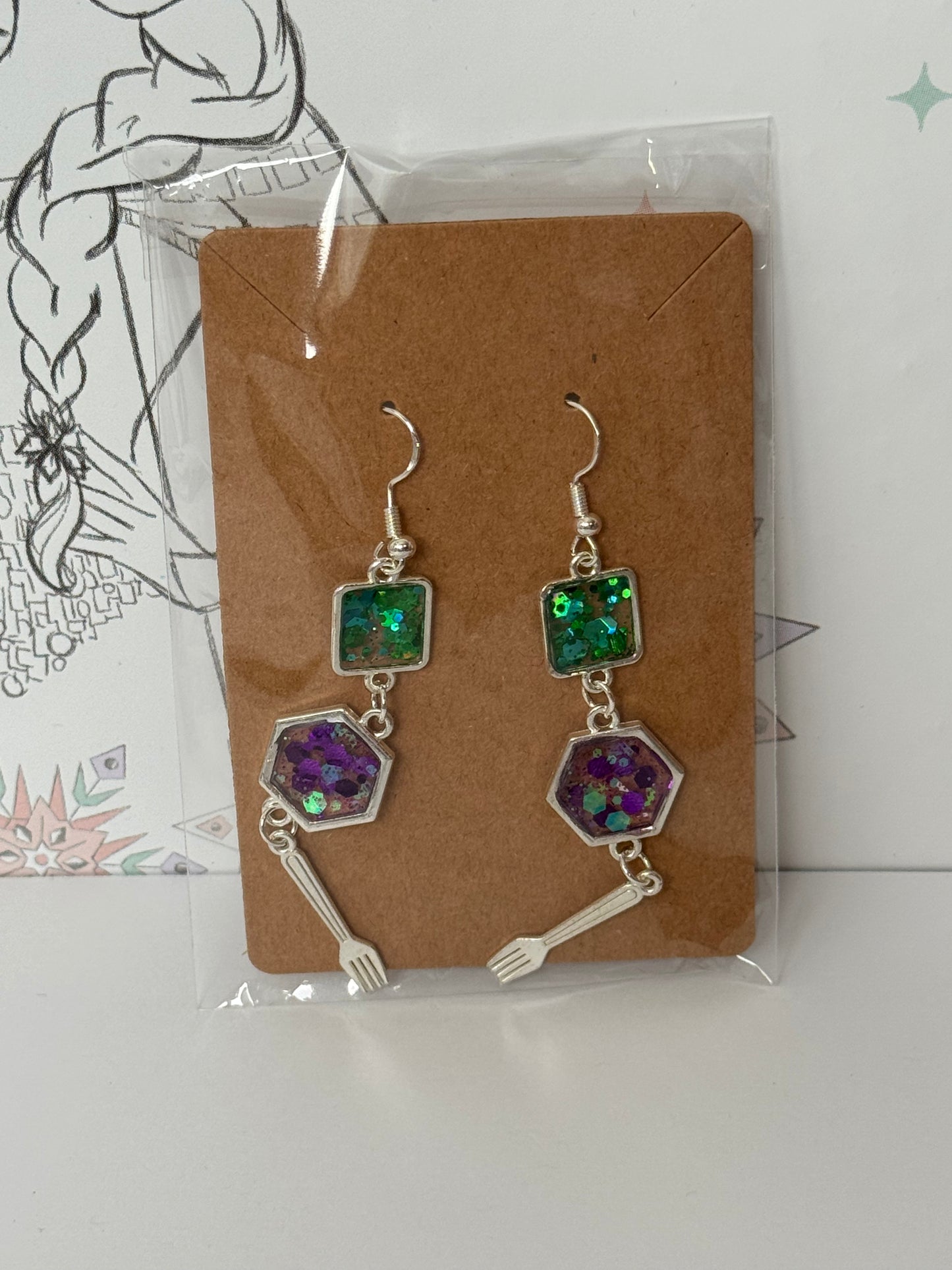 Pair of earrings with green and purple glitter resin and fork inspired by the little mermaid princess inspired